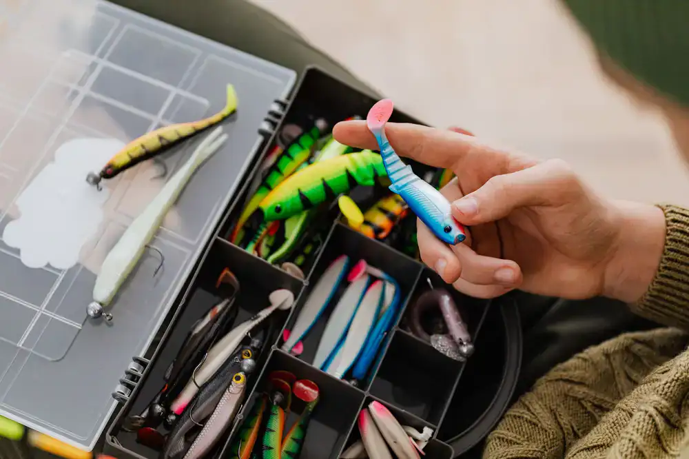 Selecting a bright lure from an open tackle box